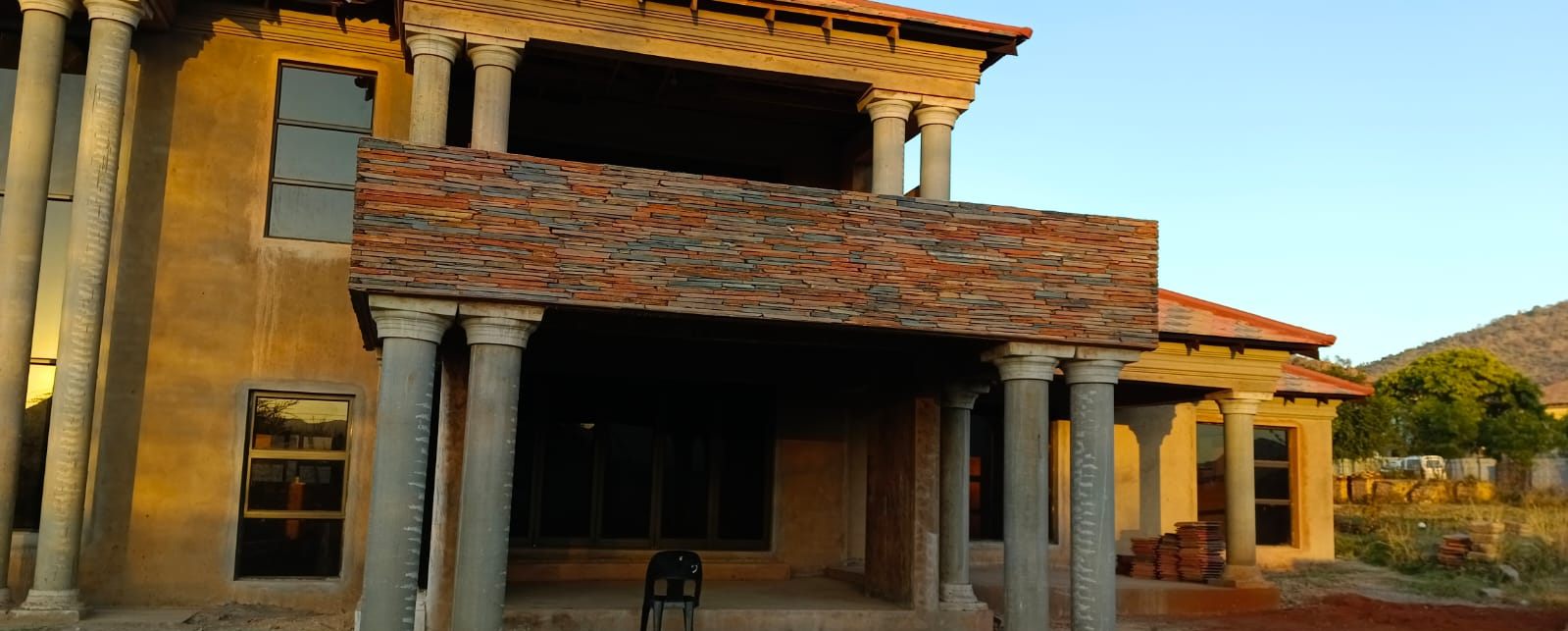 Slate balcony cladding at sunrise