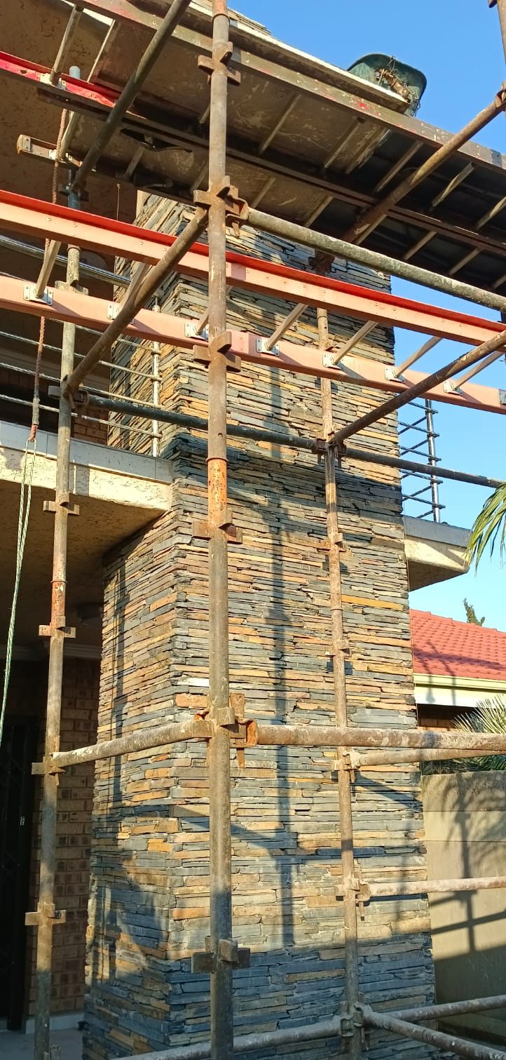 Slate column under scaffolding