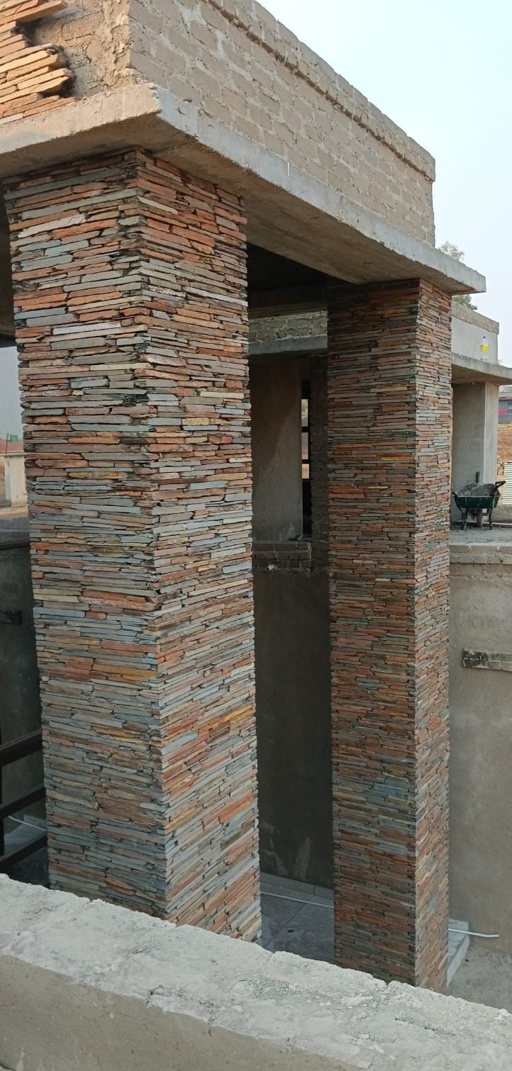 Twin rustic slate pillars